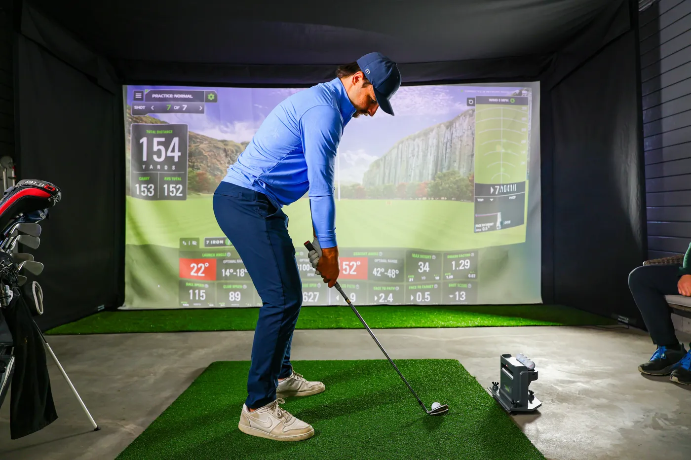 Hideaway Vanish golf simulator in a garage